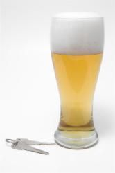 Glass of beer and car keys